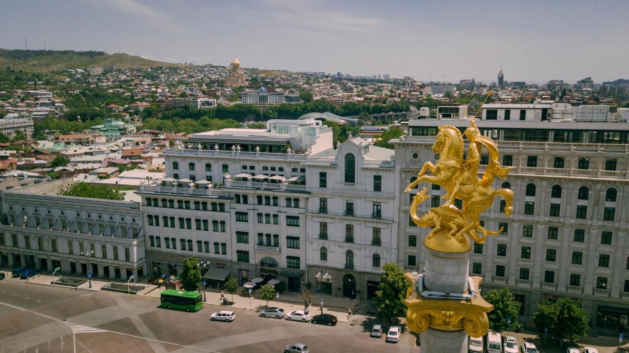 Monograph Freedom Square Hotell Tbilisi Exteriör bild Santiago skyline