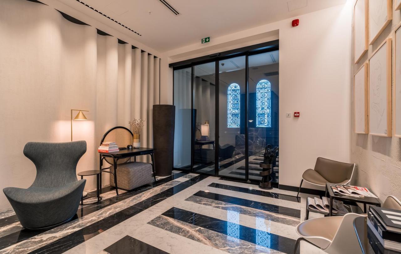 Monograph Freedom Square Hotell Tbilisi Exteriör bild The lobby of the hotel